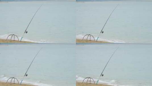 在海边旋转的钓鱼竿高清在线视频素材下载