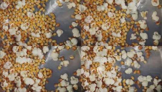 玉米在油锅中爆花高清在线视频素材下载