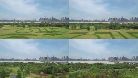 航拍杭州滨江大草坪和西兴大桥高清在线视频素材下载