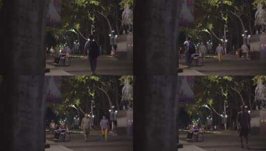 夜晚公园里散步的老人们高清在线视频素材下载