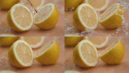把水倒在切成两半的柠檬上高清在线视频素材下载