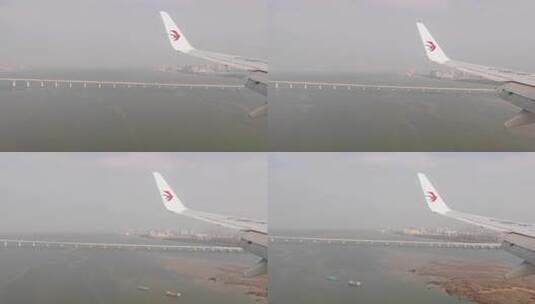 东方航空航班飞跃福建厦门翔安大桥高清在线视频素材下载