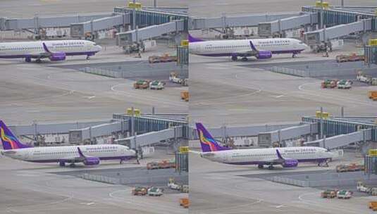 乌鲁木齐航空飞机在浦东机场跑道滑行高清在线视频素材下载