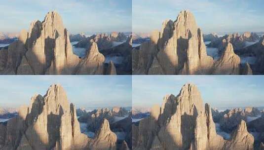 空中接近Tre Cime di Lavaredo、Sexten Dolomites的锯齿状塔楼高清在线视频素材下载