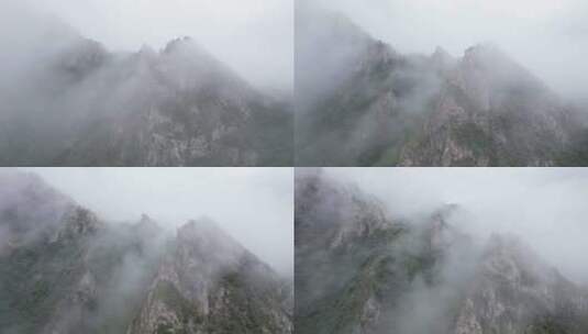 航拍云雾中的青海海东市仓家峡高清在线视频素材下载