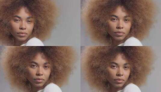 混血儿黑人妇女看着镜头的特写肖像高清在线视频素材下载