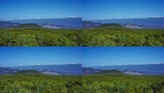 雪山下的腾冲火山森林高清在线视频素材下载