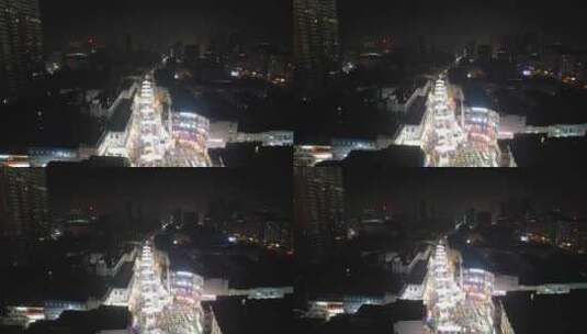 河南新乡市夜景步行街人流航拍高清在线视频素材下载