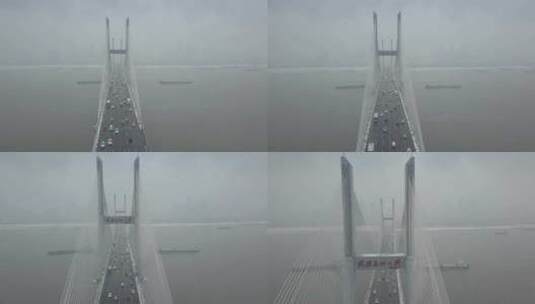 航拍武汉长江二桥冬天下雪车流货轮高清在线视频素材下载
