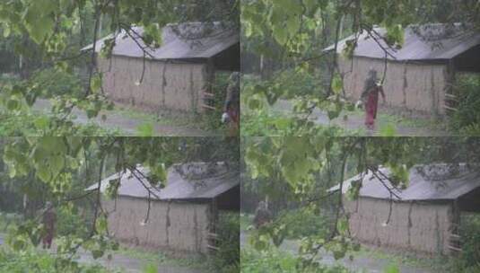 下雨时，一个女人正在乡村街道上散步。高清在线视频素材下载