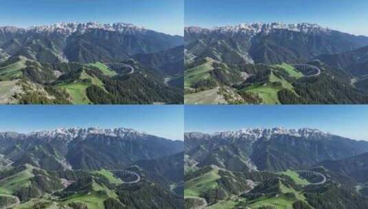 无人机航拍新疆伊犁雪山脚下的果子沟大桥高清在线视频素材下载