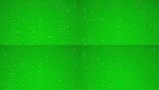 透明的水滴落在绿色的表面上高清在线视频素材下载