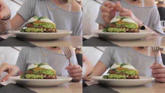 女人在吃汉堡高清在线视频素材下载