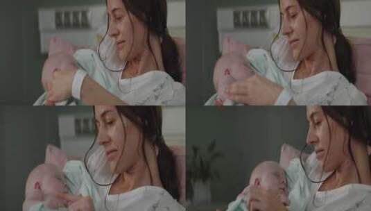 抱着新生儿的母亲高清在线视频素材下载