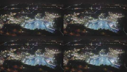 航拍高视角鸟瞰上海松江玛雅水上乐园夜景高清在线视频素材下载