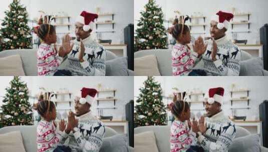 爸爸陪女儿过圣诞节玩拍手高清在线视频素材下载