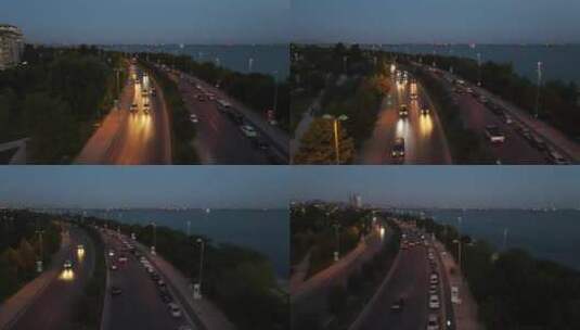 黄昏时靠近海边的城市交通高清在线视频素材下载
