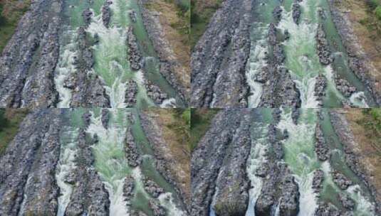 岩石间绿色的河流高清在线视频素材下载
