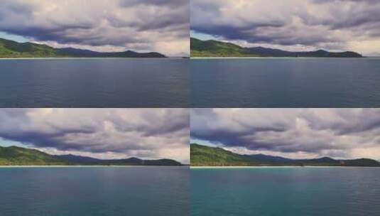 云层下的山脉湖泊景观高清在线视频素材下载
