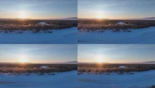 航拍冬季丛林河湾雪景灿烂朝阳高清在线视频素材下载