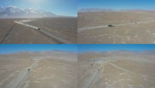 新疆公路上行驶去村庄的汽车高清在线视频素材下载