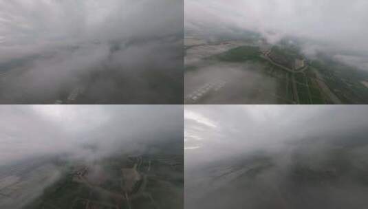 穿越机航拍清晨云层穿云农田平流雾日出高清在线视频素材下载