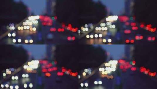 中国北京夜晚城市道路虚化光斑汽车交通景观高清在线视频素材下载