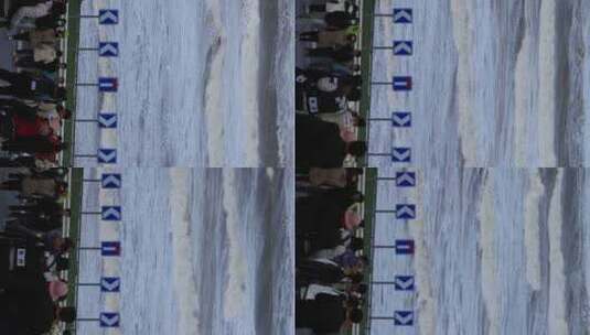 威海市国际海水浴场火炬八街海浪与打卡游客高清在线视频素材下载