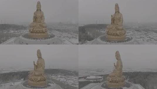 户外大型观音雕像雪景特写高清在线视频素材下载