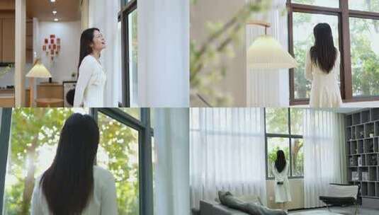 女生休闲看窗外风景高清在线视频素材下载