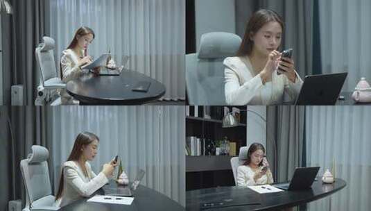 女性创业者办公室使用手机高清在线视频素材下载