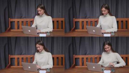 用笔记本电脑工作的女人高清在线视频素材下载