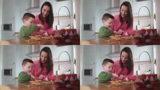 母亲和儿子一起制作姜饼高清在线视频素材下载