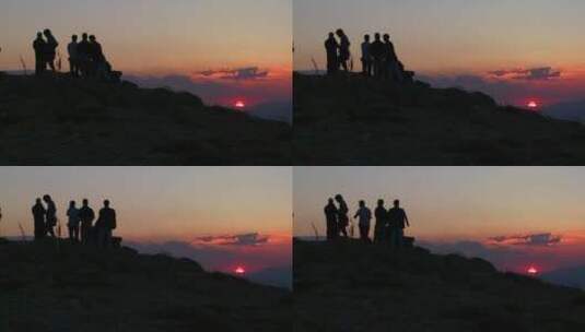 人们站在山顶看日出高清在线视频素材下载