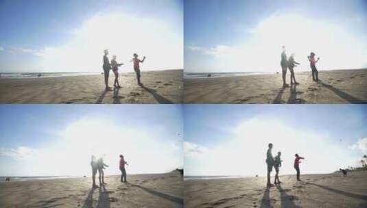 男孩在海滩上放风筝高清在线视频素材下载