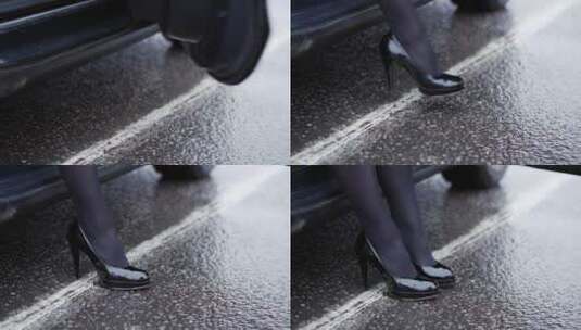 一名穿黑鞋的女子离开汽车高清在线视频素材下载