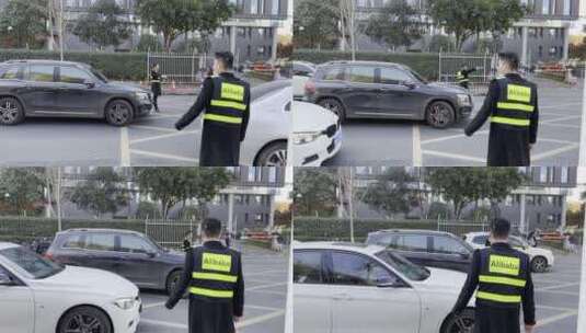 杭州滨江阿里巴巴大门口路上指挥交通的保安高清在线视频素材下载