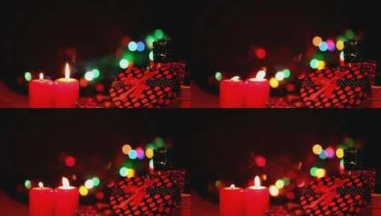 礼物和后面有闪光灯的蜡烛高清在线视频素材下载