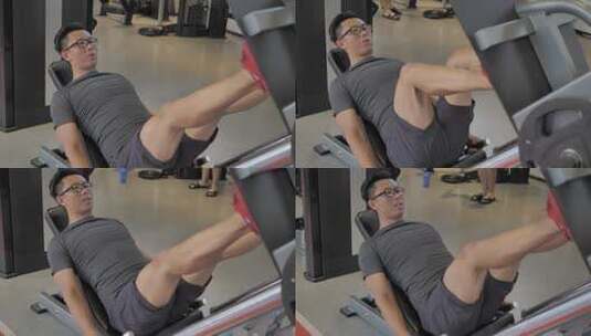 男子在健身房进行腿部肌肉锻炼高清在线视频素材下载