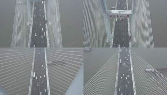 航拍武汉长江二桥冬天下雪俯拍车流高清在线视频素材下载