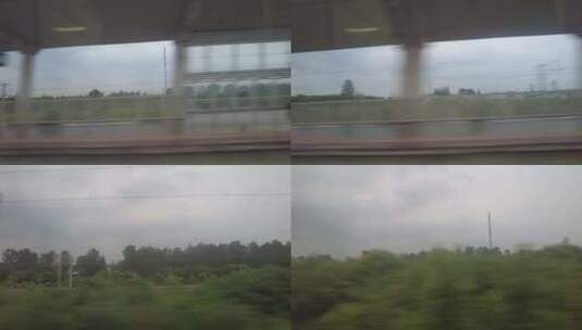 高铁火车行驶窗外风景飞快驶入实拍高清在线视频素材下载