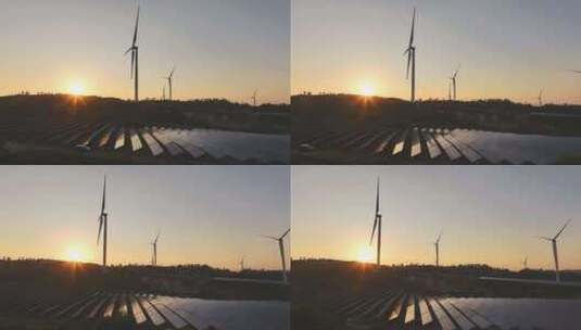 日出日落 太阳能光伏板 风力风车发电站航拍高清在线视频素材下载