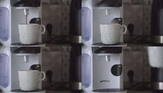 萃取咖啡 咖啡机把咖啡倒进杯子里高清在线视频素材下载