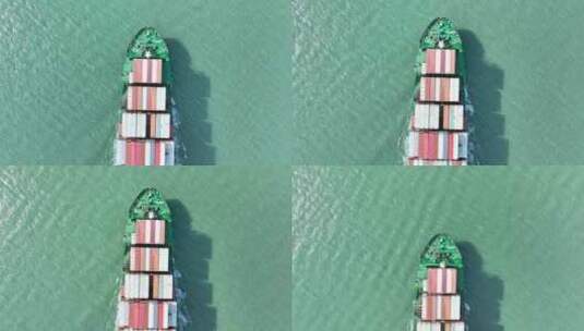 轮船进港航拍货轮航行集装箱货船远洋运输船高清在线视频素材下载
