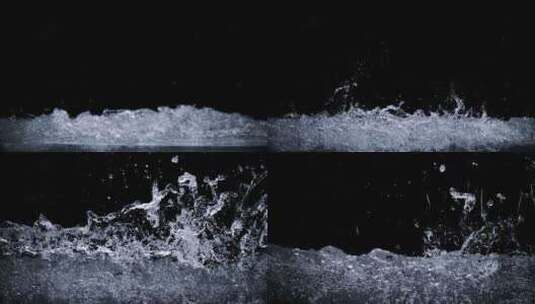 黑色背景上溅起的水-慢动作高清在线视频素材下载