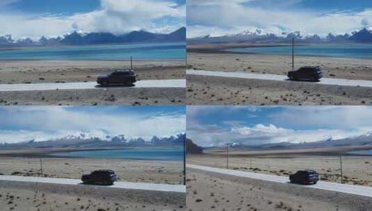 4k航拍汽车行驶在西藏佩枯措公路边高清在线视频素材下载