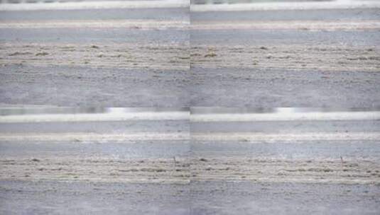 下雪后泥泞路面湿滑冰雪雪地道路结冰高清在线视频素材下载