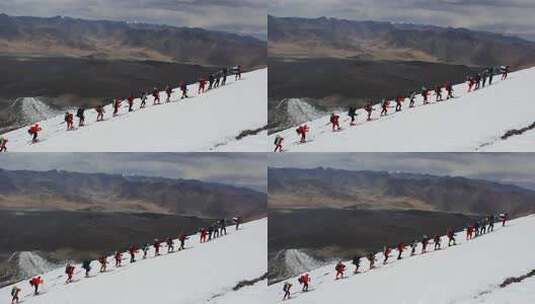 攀登冰川之父慕士塔格峰雪山的登山队队员高清在线视频素材下载