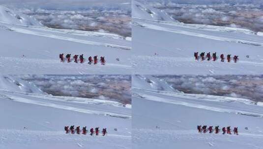 攀登冰川之父慕士塔格峰雪山的登山队高清在线视频素材下载