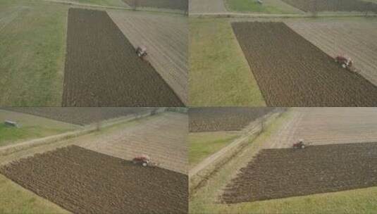 农业和农业-拖拉机在早春的田间耕作高清在线视频素材下载